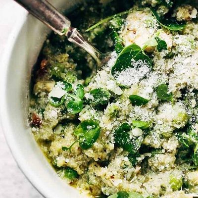 Crockpot Quinoa Chicken Primavera in a bowl with fork.