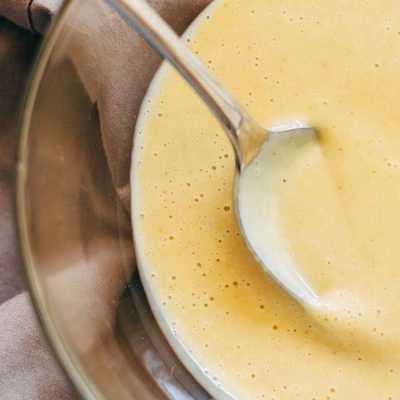 5 Minute Honey Mustard Sauce in a bowl with a spoon.