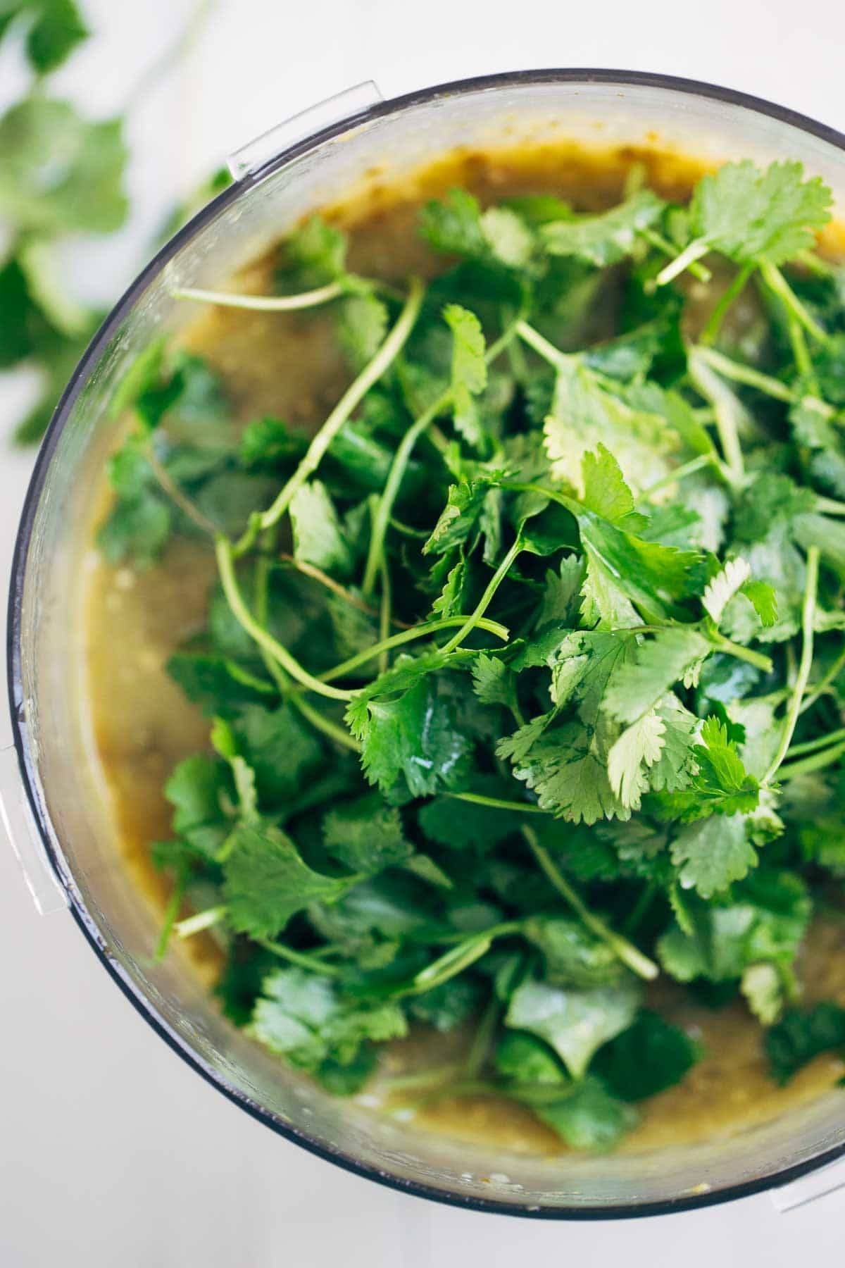 Cilantro in a food processor.